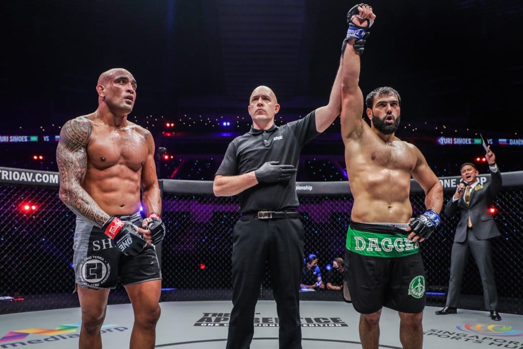 Daniyal Zainalov celebrates beating Yuri Simoes. Photo: One Championship