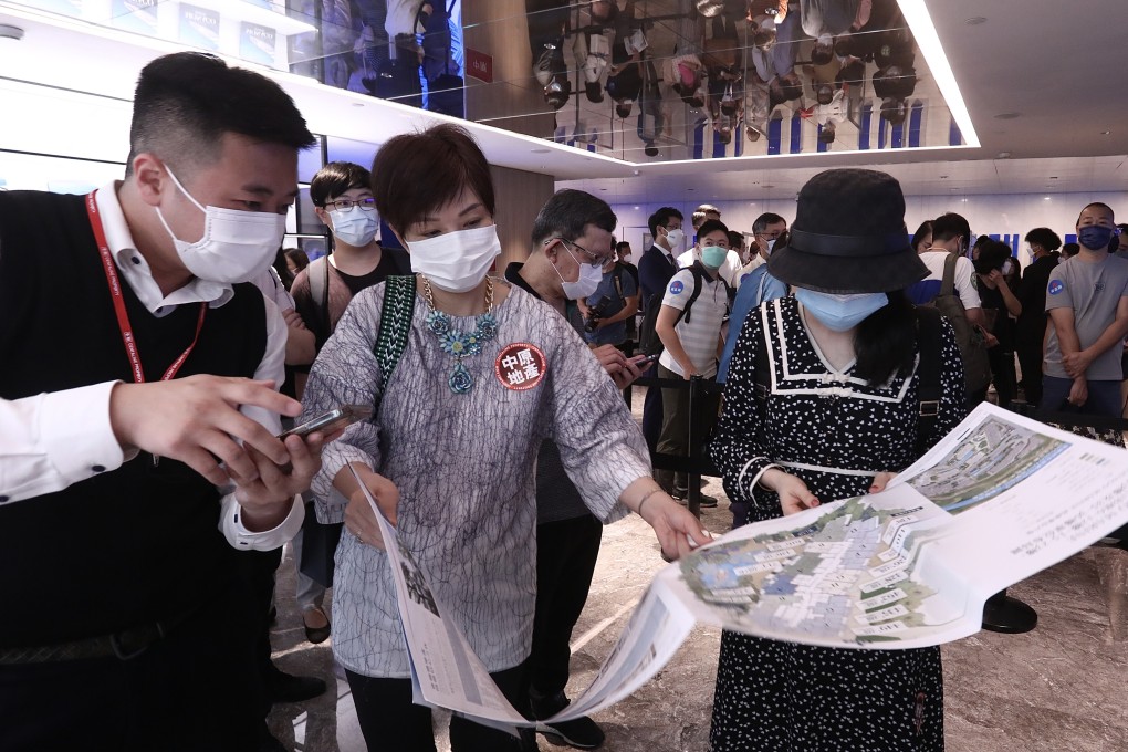 Buyers queueing for Wheelock Properties’ Monaco Marine apartments in Kai Tak at the developer’s sales office at the Prince Hotel in Tsim Sha Tsui on 23 April 2022. Photo: Jonathan Wong