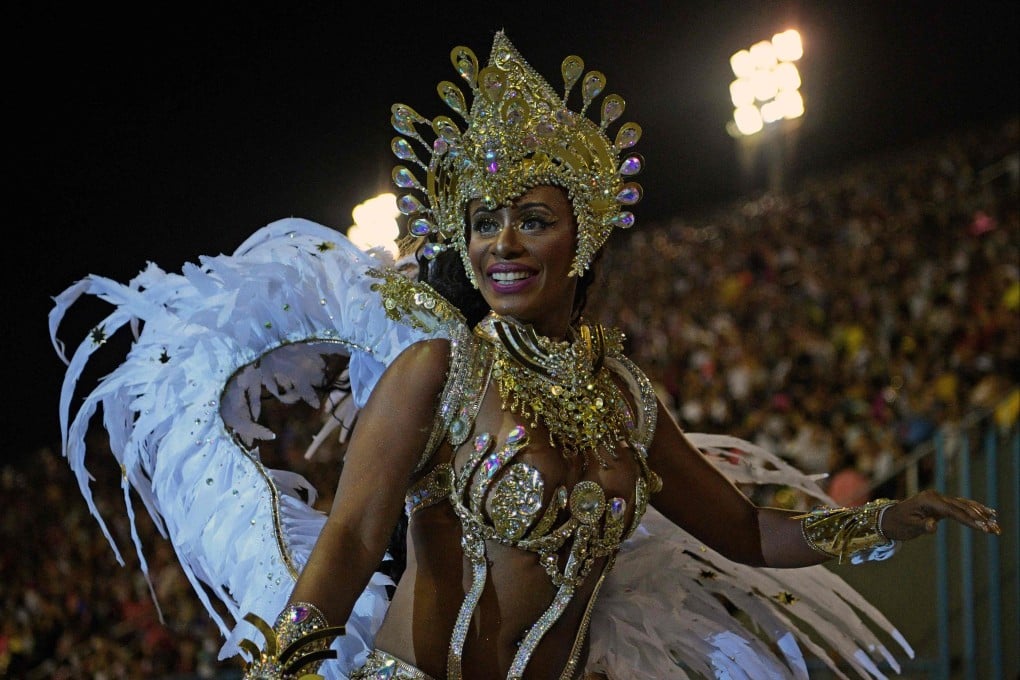 A member of Beija Flor samba school performs during the first night of Rio’ de Janeiro’s Carnival parade at the Sambadrome Marques de Sapucai in Rio de Janeiro, Brazil on April 22. Photo: AFP