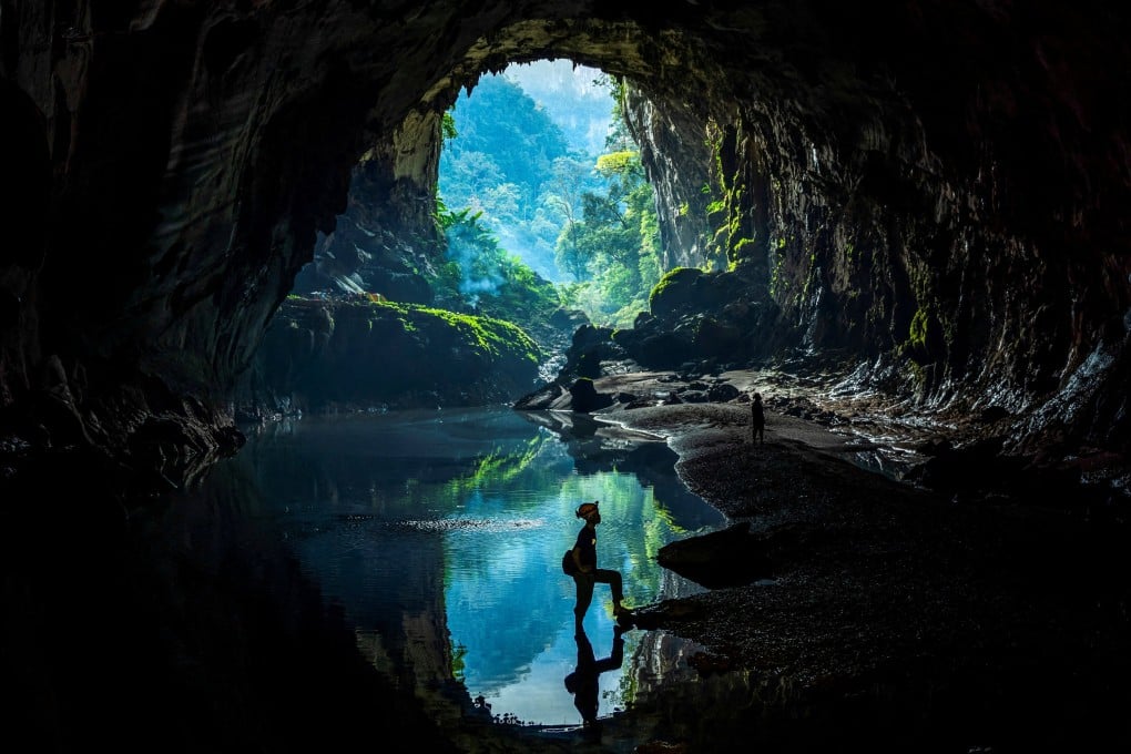 Former illegal logger Ngoc Anh, 36, poses for a picture in Phong Nha-Ke Bang National Park, Vietnam’s Quang Binh province, where he now works as a tour guide. Photo: Reuters