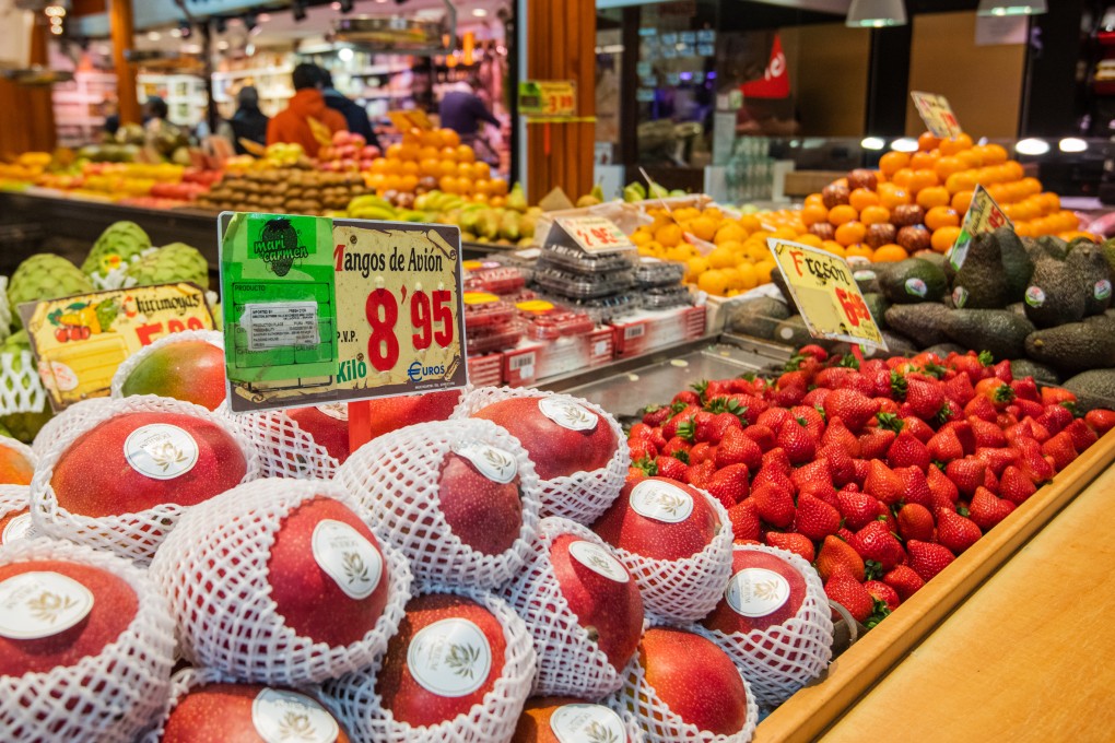 Fresh fruit is seen for sale at a market in Madrid on April 20. Spain’s central bank has doubled its inflation forecasts for 2022 and 2023 while trimming its outlook for economic expansion as Russia’s invasion of Ukraine fans already-soaring energy and food costs. Photo: Bloomberg