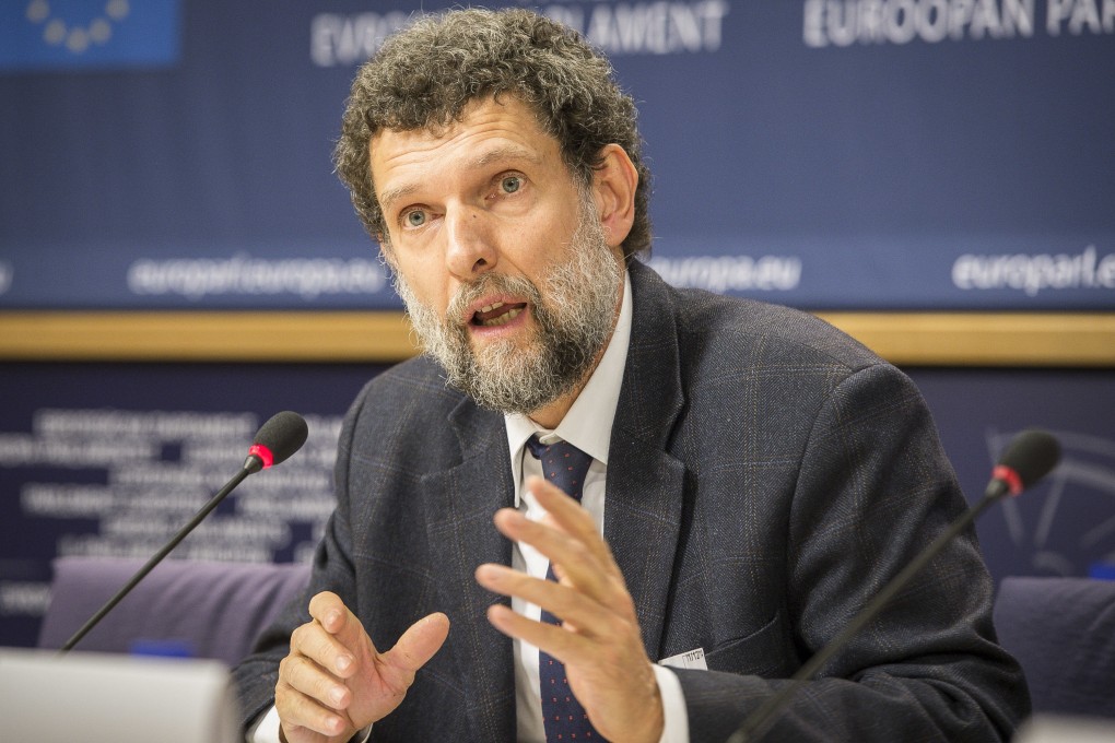 Osman Kavala, Turkish philanthropist, entrepreneur and rights defender, speaks at a press conference at the EU Parliament in December 2014. Photo: dpa