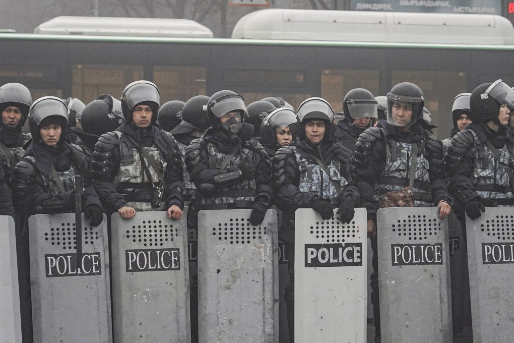 Kazakh police officers monitor protests in Almaty, Kazakhstan, in January. Photo: EPA-EFE
