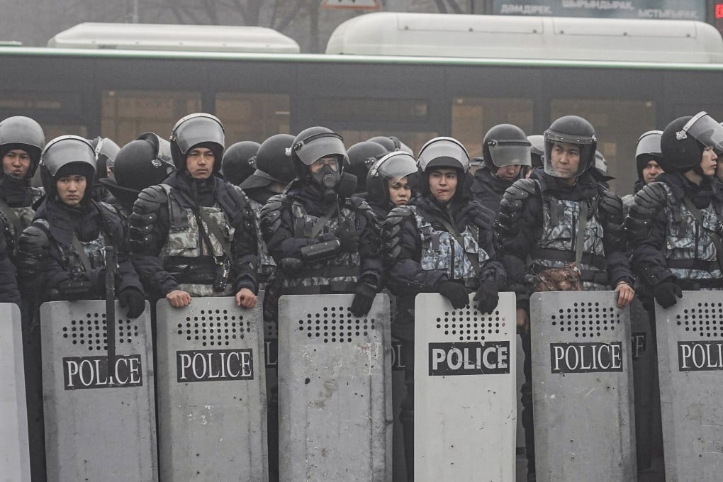 Kazakh police officers monitor protests in Almaty, Kazakhstan, in January. Photo: EPA-EFE
