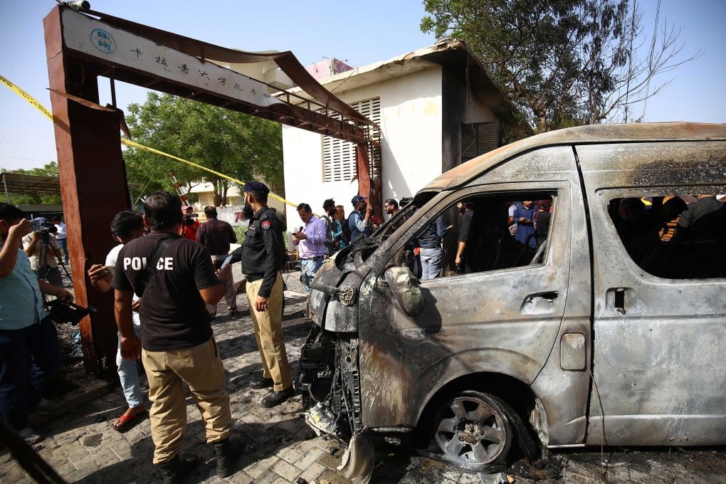 Pakistani security officials inspect the scene of an explosion in Karachi. Photo: EPA-EFE