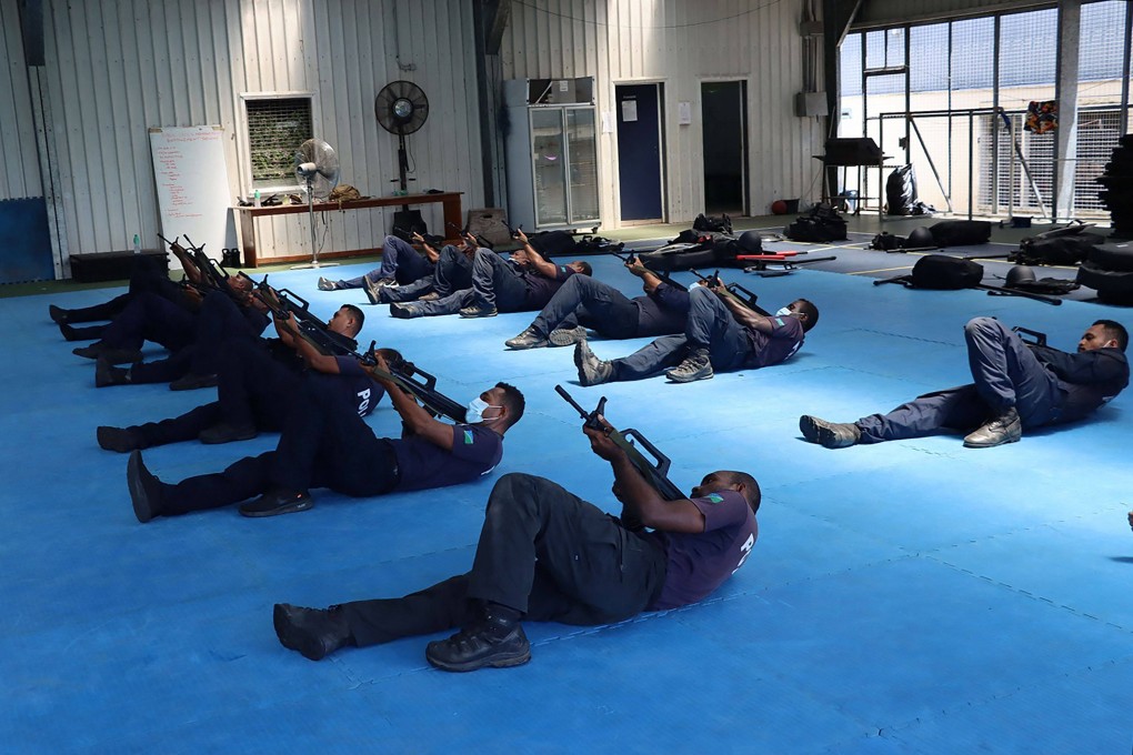 Solomon Islands police train with officers from a Chinese police liaison team in this undated handout picture. Photo: Royal Solomon Islands Police Force Handout via AFP