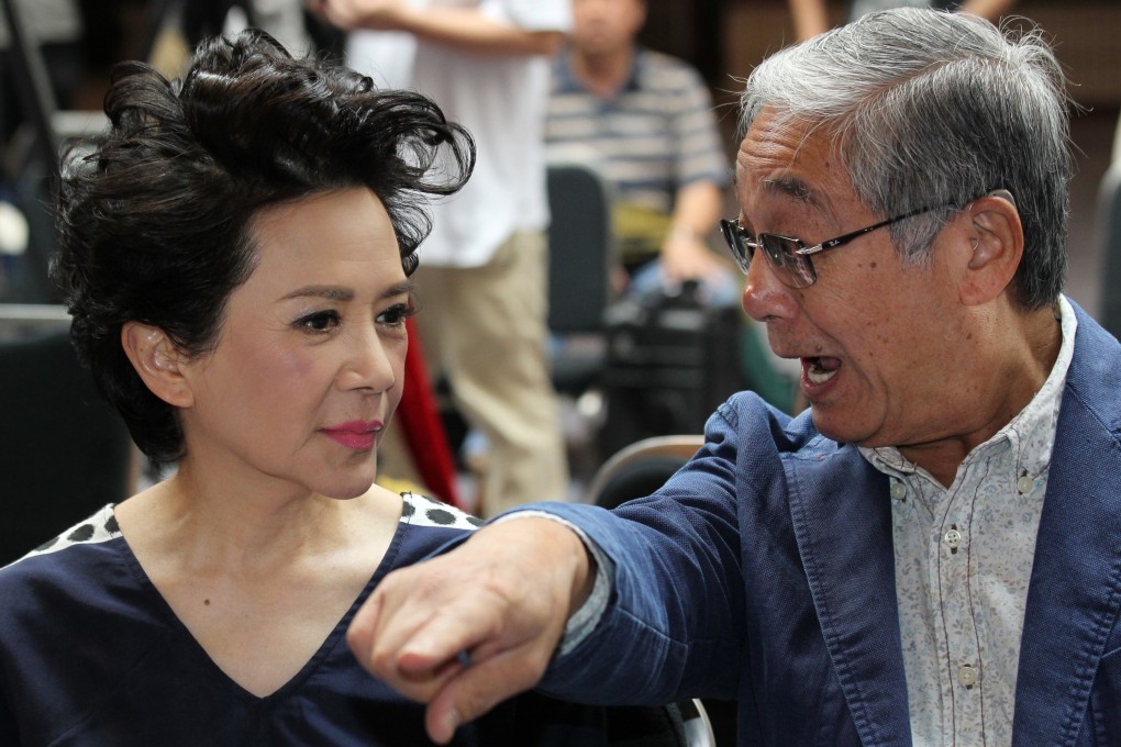 Kenneth Tsang Kong in animated conversation with actress Deanie Ip at the announcement of nominees for the 31st Hong Kong Film Awards in 2012. Tsang, who has died aged 86, won best supporting actor at the awards three years later. Photo: Dickson Lee