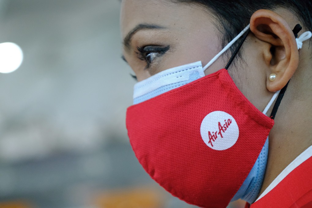 An AirAsia employee at Kuala Lumpur International Airport 2 in Sepang, Selangor, Malaysia. Photo: Bloomberg