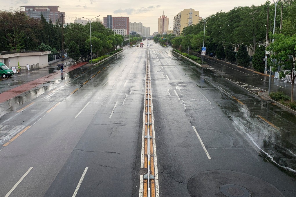 A road in the central Chaoyang district is almost empty on April 27 as parts of Beijing undergo a lockdown to control the spread of Covid-19. The prospect of further widespread lockdowns and disruptions to supply chains has made China one of global investors’ chief worries. Photo: Reuters