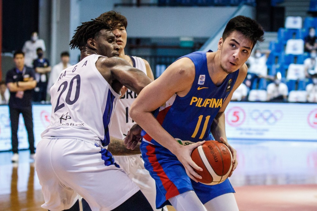 Kai Sotto of the Philippines in action against Guna Ra of South Korea during the FIBA Asia Cup 2021 qualifiers. Photo: EPA-EFE