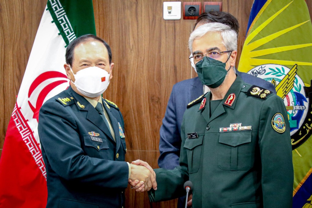 Iranian Armed forces chief of staff Mohammad Bagheri (right) greets China’s Defence Minister Wei Fenghe. Photo: EPA-EFE