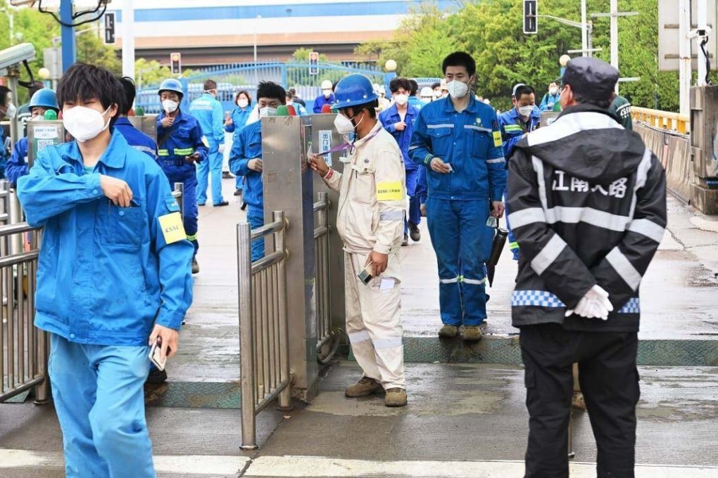 Workers return to Jiangnan shipyard in Shanghai for a stress test rehearsal before work resumes on China’s third aircraft carrier. Photo: Chongming District Government