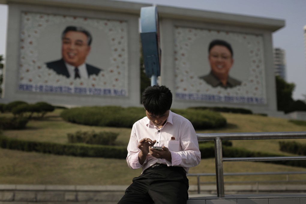 A man uses a smartphone in Pyongyang. A few tech-savvy North Koreans have managed to circumvent tight government controls on smartphone use. Photo: AP