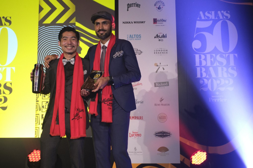 Jay Khan (right) and bar manager Lok Cheung of Hong Kong’s Coa with the award for coming top in the Asia’s 50 Best Bars list, presented in Bangkok. Photo: Coa