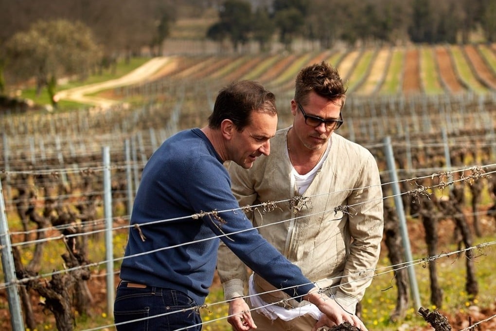 Brad Pitt in one of his French vineyards. His Fleur de Miraval Rosé Champagne will soon be offering NFTs. Photo: @wine_spectator/Instagram