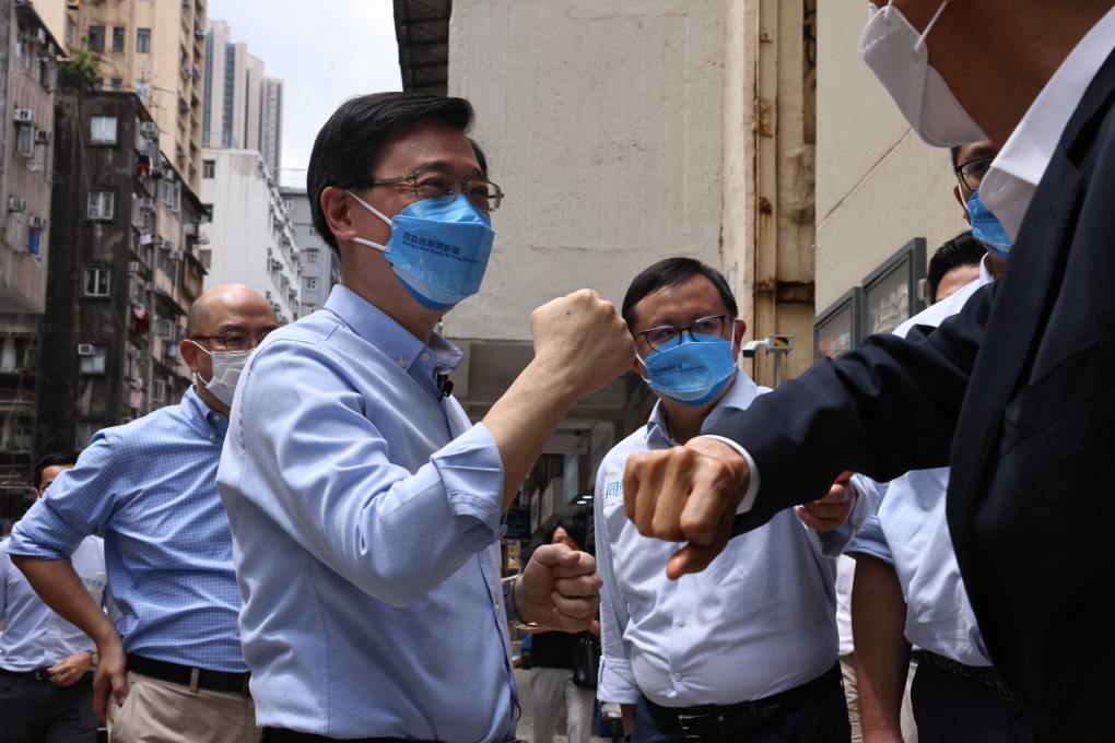Chief executive candidate John Lee visits an NGO in Jordan as part of his campaign outreach efforts on April 24. Photo: K.Y. Cheng