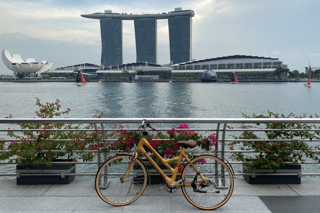 A 500km network of new and improved cycle paths makes it an attractive pursuit for visitors and residents alike, who can take in views like this one of Marina Bay. Photo: Tamara Hinson