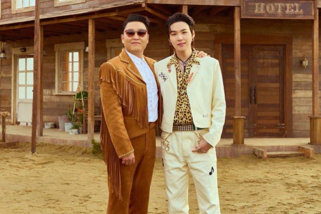 Psy (left) and Suga of K-pop boy band BTS. Suga is the featured artist on – and producer of – Psy’s new song That That.