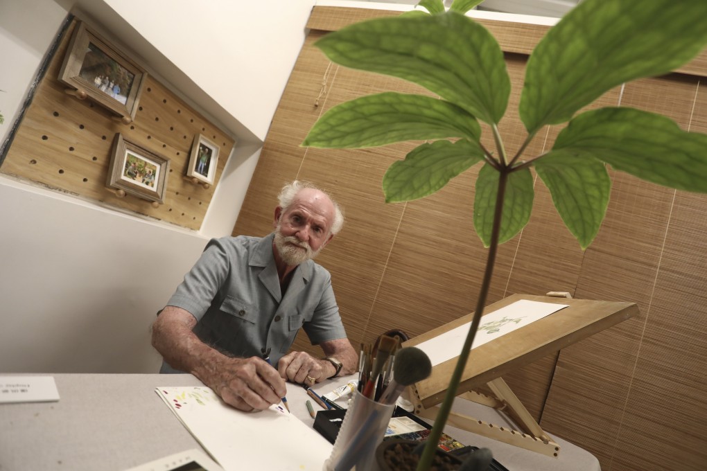 Mark Isaac-Williams at an exhibition of his paintings at Kadoorie Farm and Botanic Garden, where he worked on and off for decades after growing up in post-war Hong Kong. Photo: Jonathan Wong