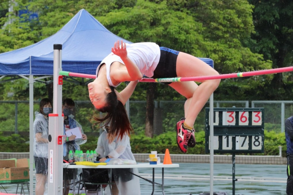 Priscilla Cheung jumping in the rain today. Photo: Shirley Chui