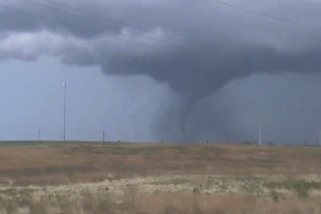 A tornado passes south-central Kansas on April 29. Photo: The Wichita Eagle via AP