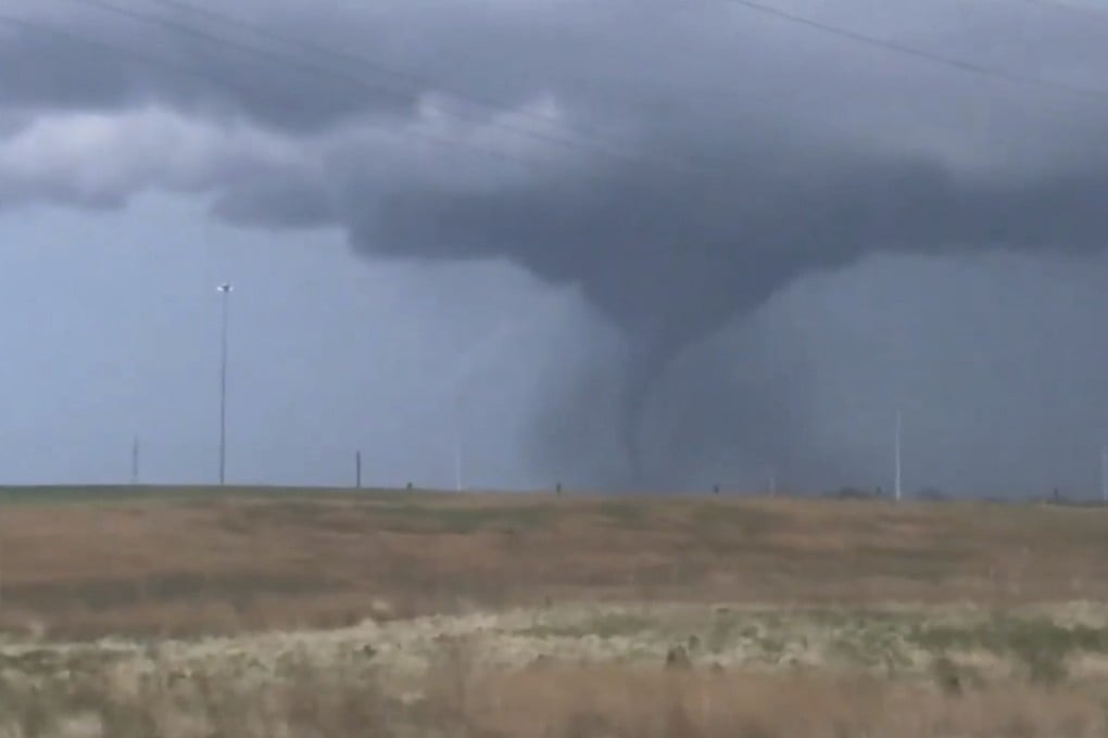 A tornado passes south-central Kansas on April 29. Photo: The Wichita Eagle via AP