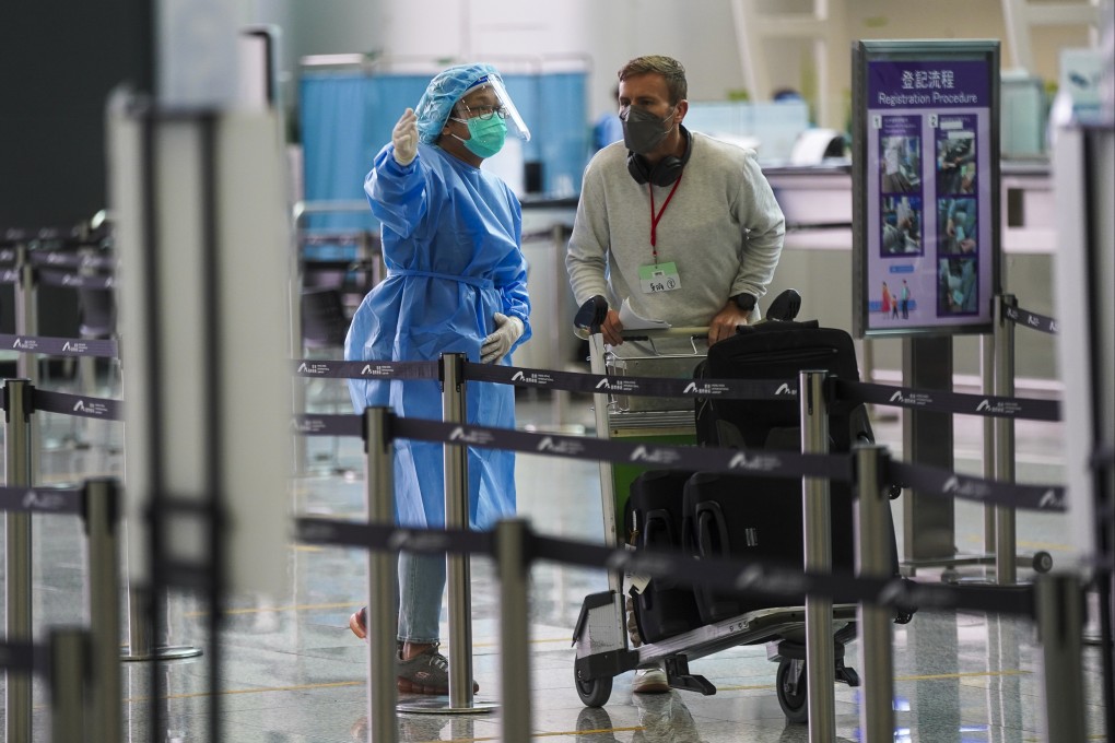 A passenger arrives at Hong Kong airport on May 1, the first day in about two years non-residents are allowed to fly in. Photo: Sam Tsang