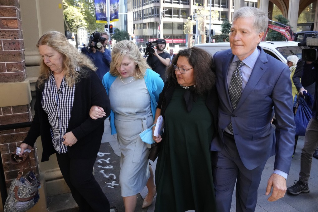 Steve Johnson with his sisters (left) and his wife (second right) arrive at the Supreme Court in Sydney on Monday. Photo: AP