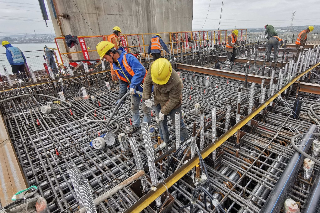 Workers at the construction site of the high-speed railway linking Nanning and Yulin in south China’s Guangxi Zhuang Autonomous Region on January 11. On April 26, China unveiled a plan to boost infrastructure investment. Photo: Xinhua