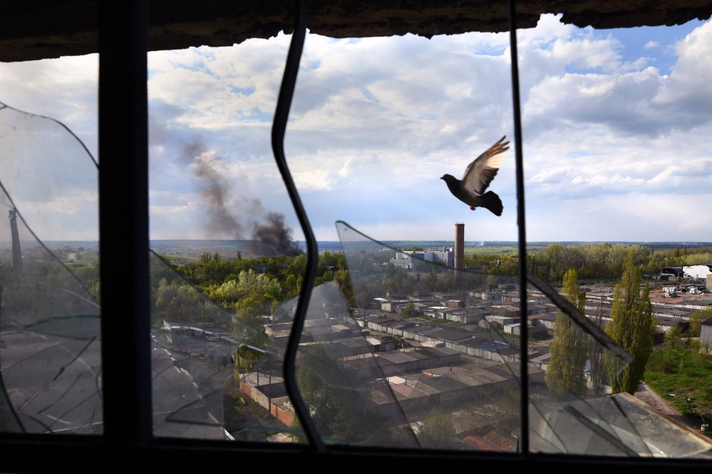 A view from the destroyed window of a building amid shelling in Kharkiv, Ukraine, in early May. Photo: Zuma Press Wire/DPA