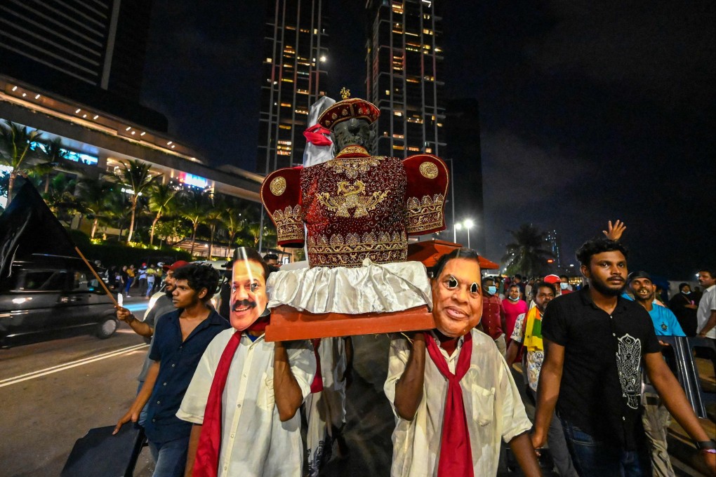 Sri Lankan protesters hold an anti-government demonstration outside the president’s office in Colombo on Tuesday to demand his resignation. Photo: AFP