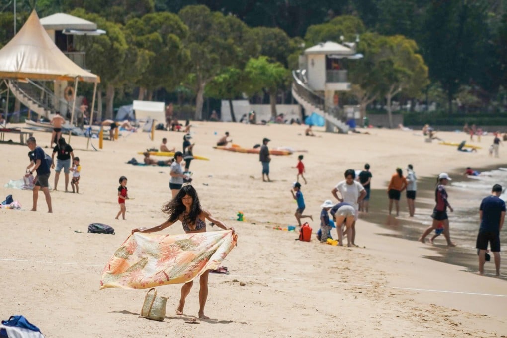 Residents enjoy a day at the beach in Repulse Bay on Thursday. Photo: Felix Wong
