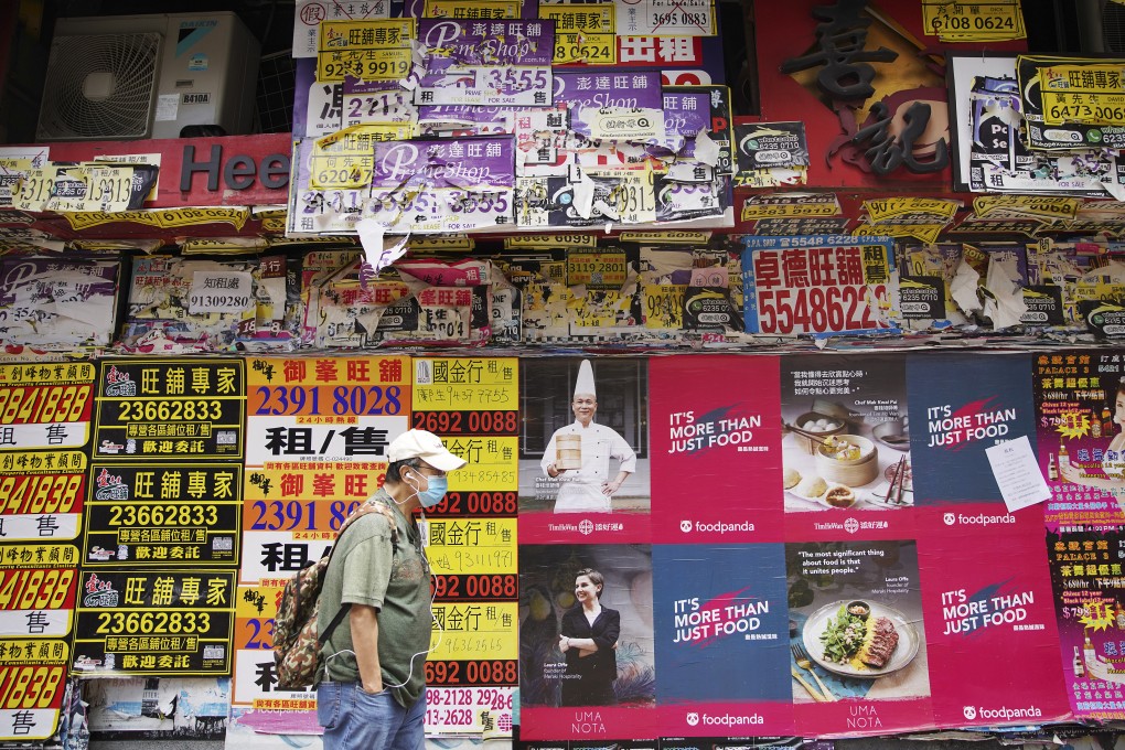 A man walked past a closed retail shop in Causeway Bay on 27 June 2020. Photo: Winson Wong