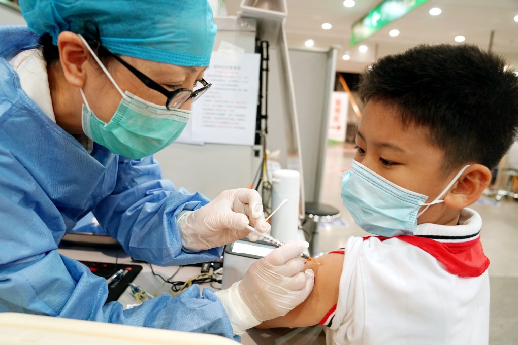 Researchers at Fudan University’s children’s hospital in Shanghai say vaccinated children are significantly less likely to show symptoms if they are infected with Covid-19. Photo: Xinhua
