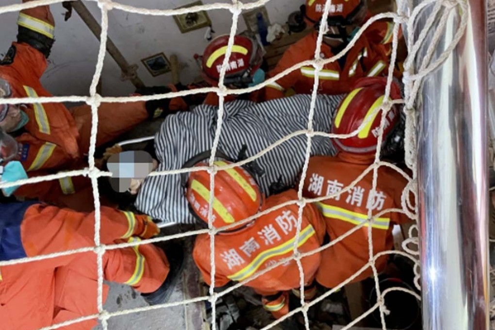 A young woman has stunned rescuers after surviving under a collapsed building with half a bottle of water and a blanket for more than 130 hours. Photo: SCMP Artwork