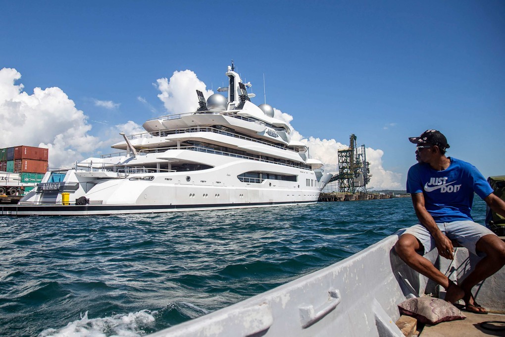 A photo taken shows the superyacht Amadea, reportedly owned by a Russian oligarch, berthed at the Queens Wharf in Lautoka. Photo by Leon LORD/FIJI SUN/AFP