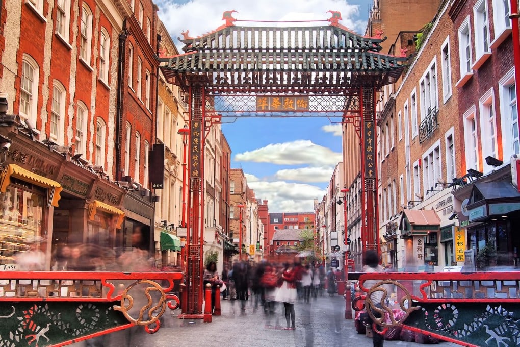 If you can’t get to China because of Covid restrictions, why not take a Chinese food, drink and cultural tour around London. Above: tourists on Gerrard Street, Chinatown, London. Photo: Getty Images
