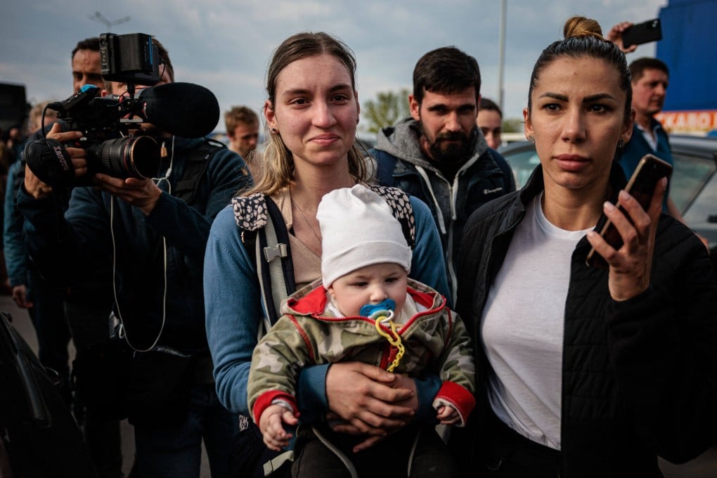 Anna Zaitseva and her son Svyatoslav, 6 month old, arrive from Mariupol after they were “successfully evacuated” from Ukraine’s besieged and battered port city of Mariupol. Photo: AFP