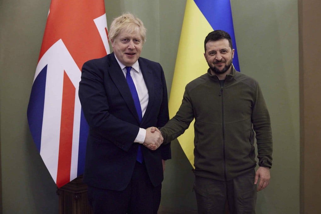 Ukrainian President Volodymyr Zelenskyy, right, and Britain’s Prime Minister Boris Johnson shake hands during their meeting in Kyiv, Ukraine on April 9. The UK has pledged an additional US$1.6 billion in military aid to Ukraine. Photo: Ukrainian Presidential Press Office via AP