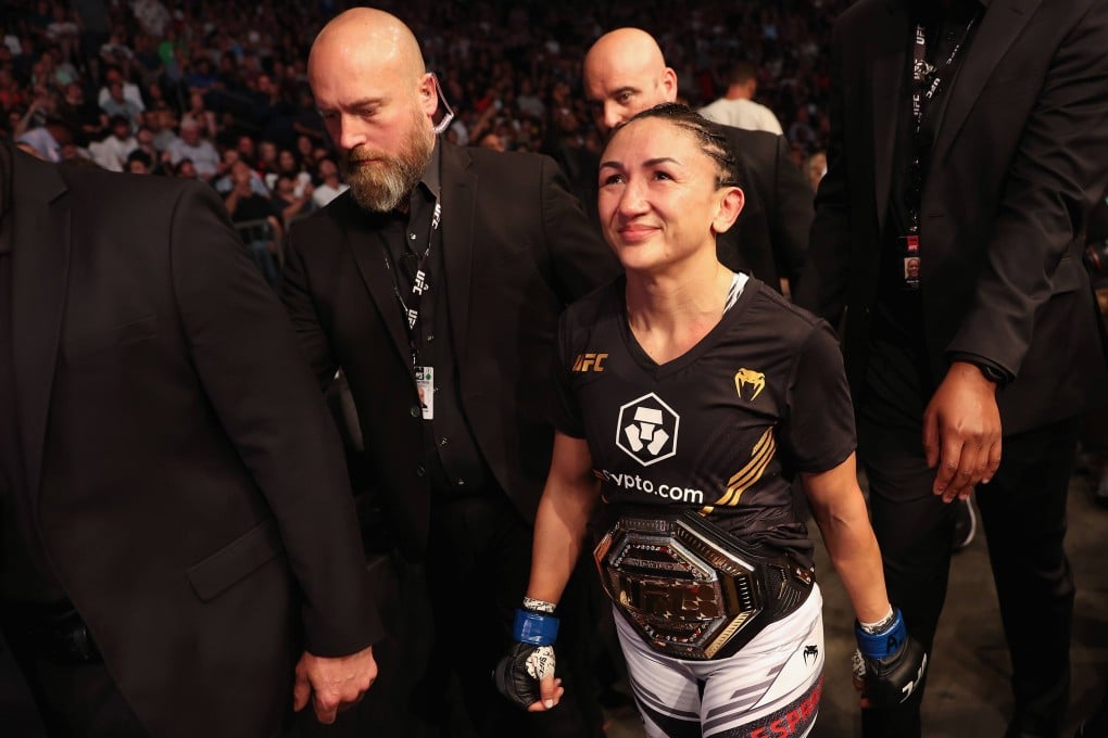 Carla Esparza leaves the Octagon after her victory over Rose Namajunas at UFC 274. Photo: AFP