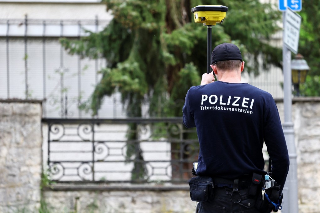 Berlin criminal investigators on the scene after a device was found and destroyed at a residential building housing Russian news agency staff in the city’s Steglitz district on May 7. Photo: Reuters