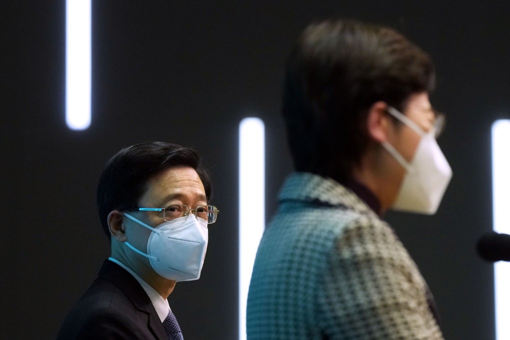 Hong Kong’s Chief Executive-elect John Lee (left) addresses the press with Carrie Lam on Monday, a day after his victory. Photo: Sam Tsang