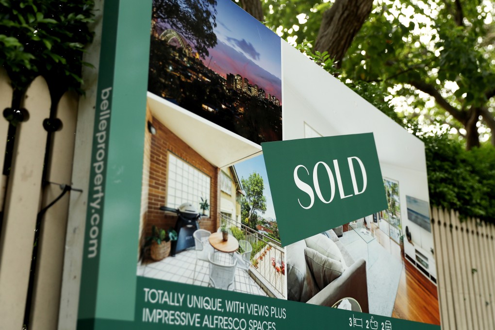 A “sold” sign is displayed across an advertisement for a house in Sydney. Australia was among the world’s fastest-growing housing markets last year. Photo: Bloomberg