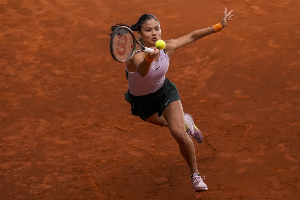 Emma Raducanu returns the ball against Marta Kostyuk during their match at the Madrid Open. Photo: AP