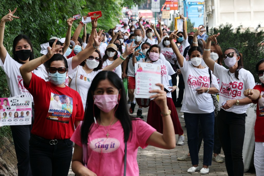 Filipinos pose for a photo outside the overseas voting station in Kennedy Town on Monday. Photo: Yik Yeung-man