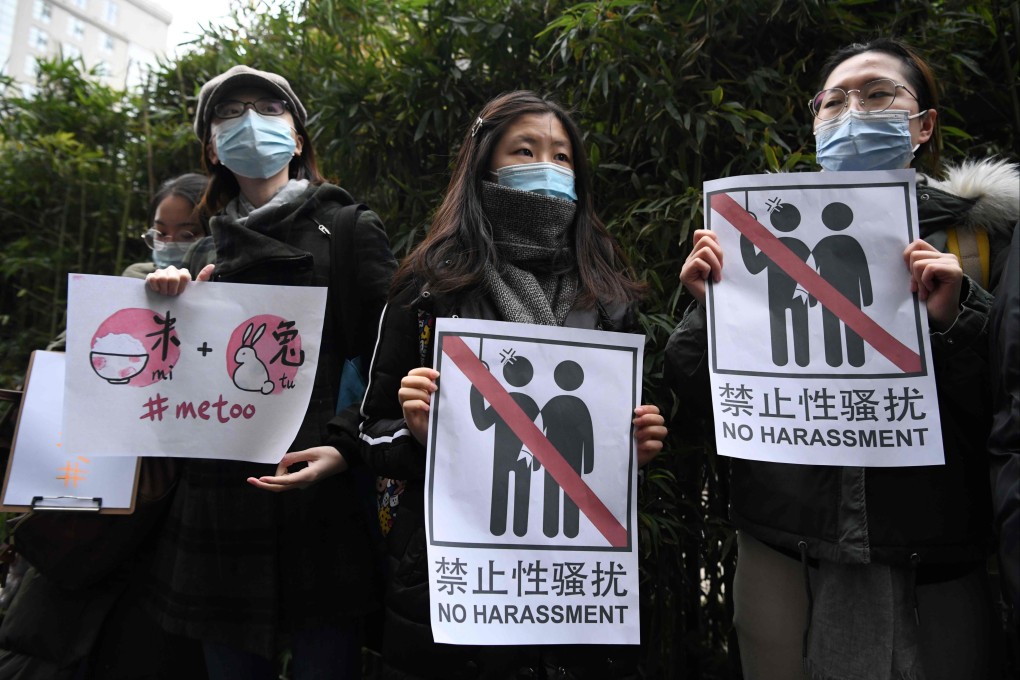 Supporters of Zhou Xiaoxuan, a feminist figure who rose to prominence during China’s #MeToo movement, display posters outside the Haidian District People’s Court in Beijing. Photo: AFP