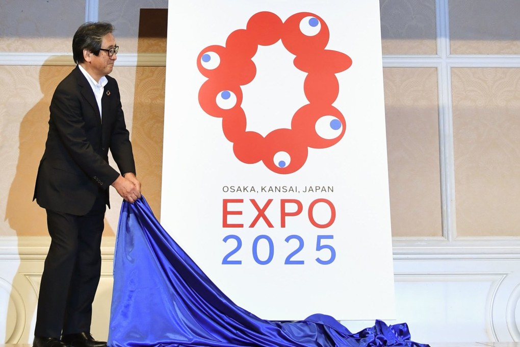 The official logo of the 2025 Osaka-Kansai World Exposition, containing a variation on the design of the multi-eyed mascot, is unveiled in Osaka in 2020. Photo: Kyodo