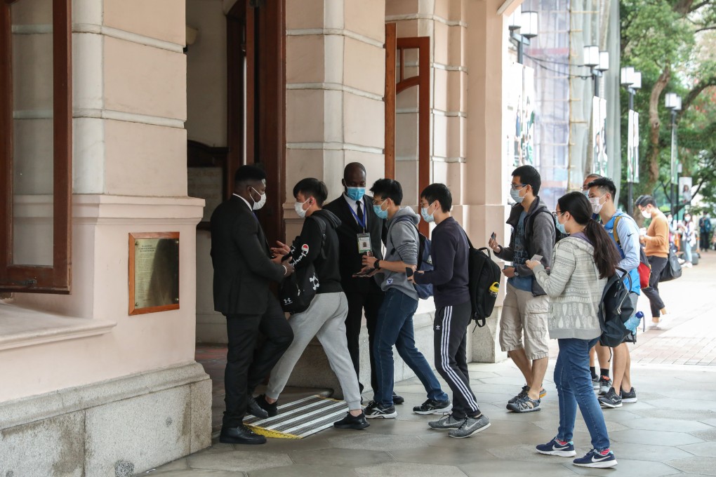Students wearing masks enter the University of Hong Kong campus in Pok Fu Lam amid coronavirus in 2020. Photo: Nora Tam