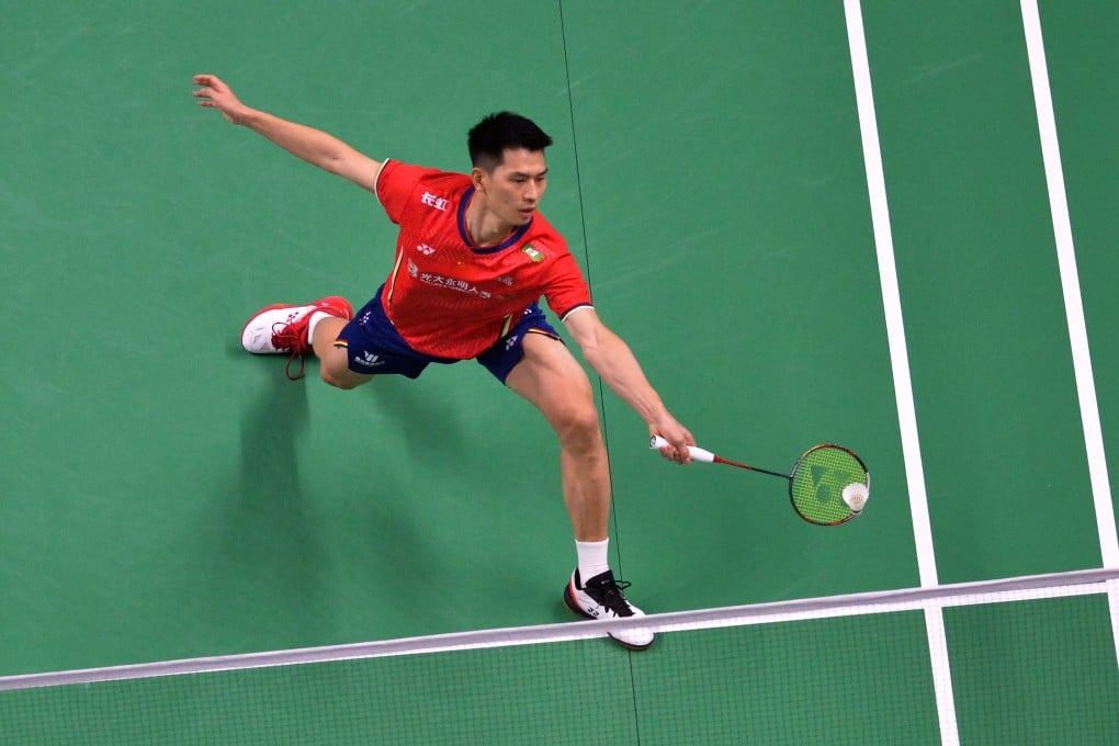 Zhao Jun Peng of China competes against Koceila Mammeri of Algeria during a Group B match at the Thomas Cup badminton tournament in Bangkok. Photo: Xinhua