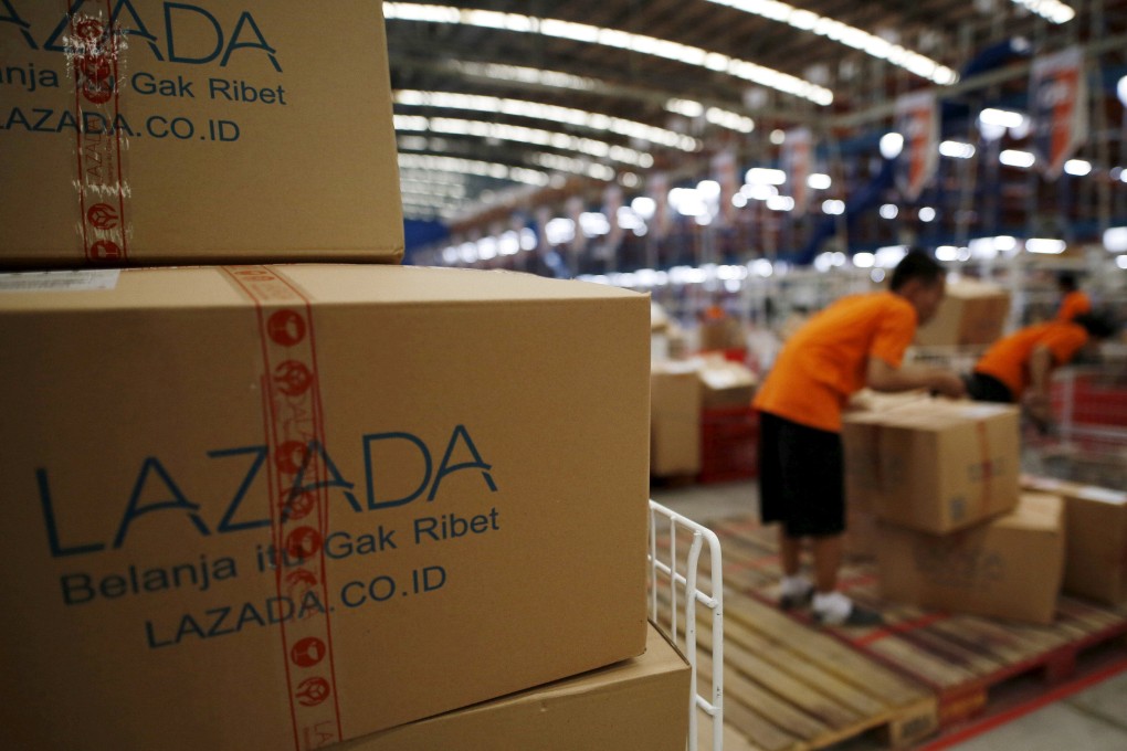 Employees at online retailer Lazada fill orders at the company’s warehouse in Jakarta, Indonesia. Photo: Reuters